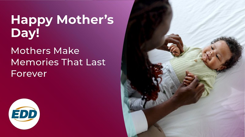 A mother playing with her baby lying on its back. To the left is the EDD logo and a slogan reading “Happy Mother’s Day! Mothers Make Memories that Last Forever.”